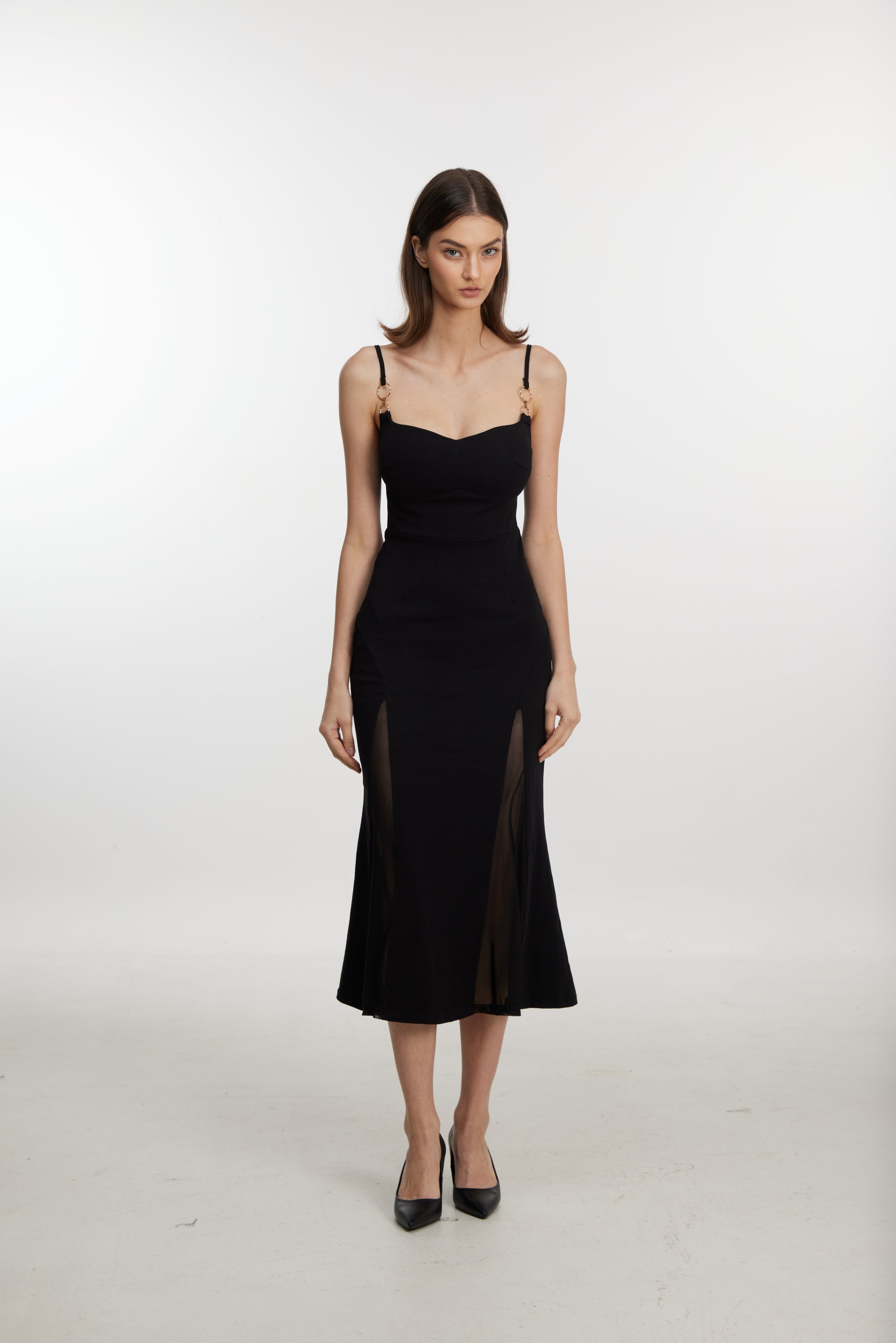 Black slip dress with side cutouts