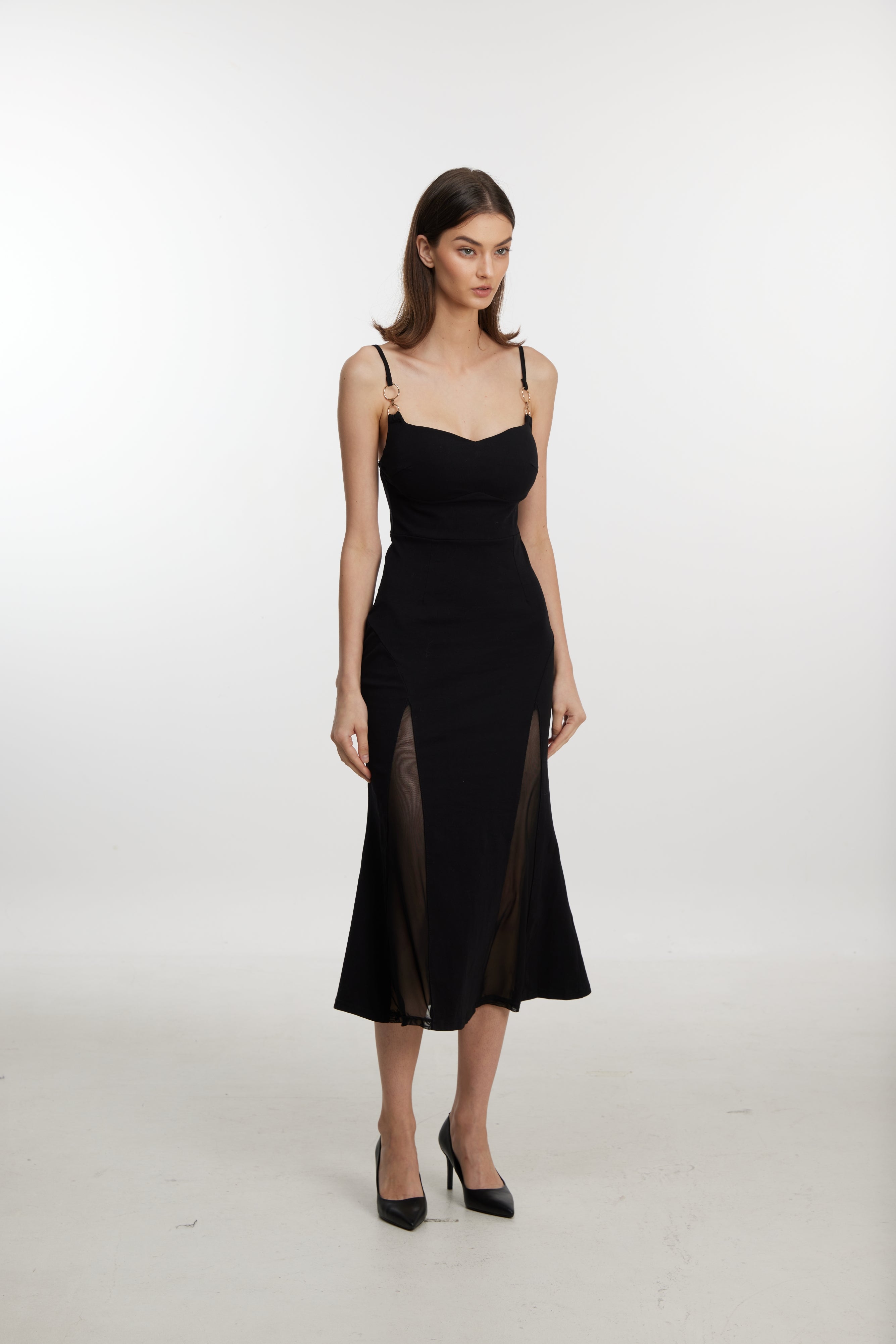 Black slip dress with side cutouts