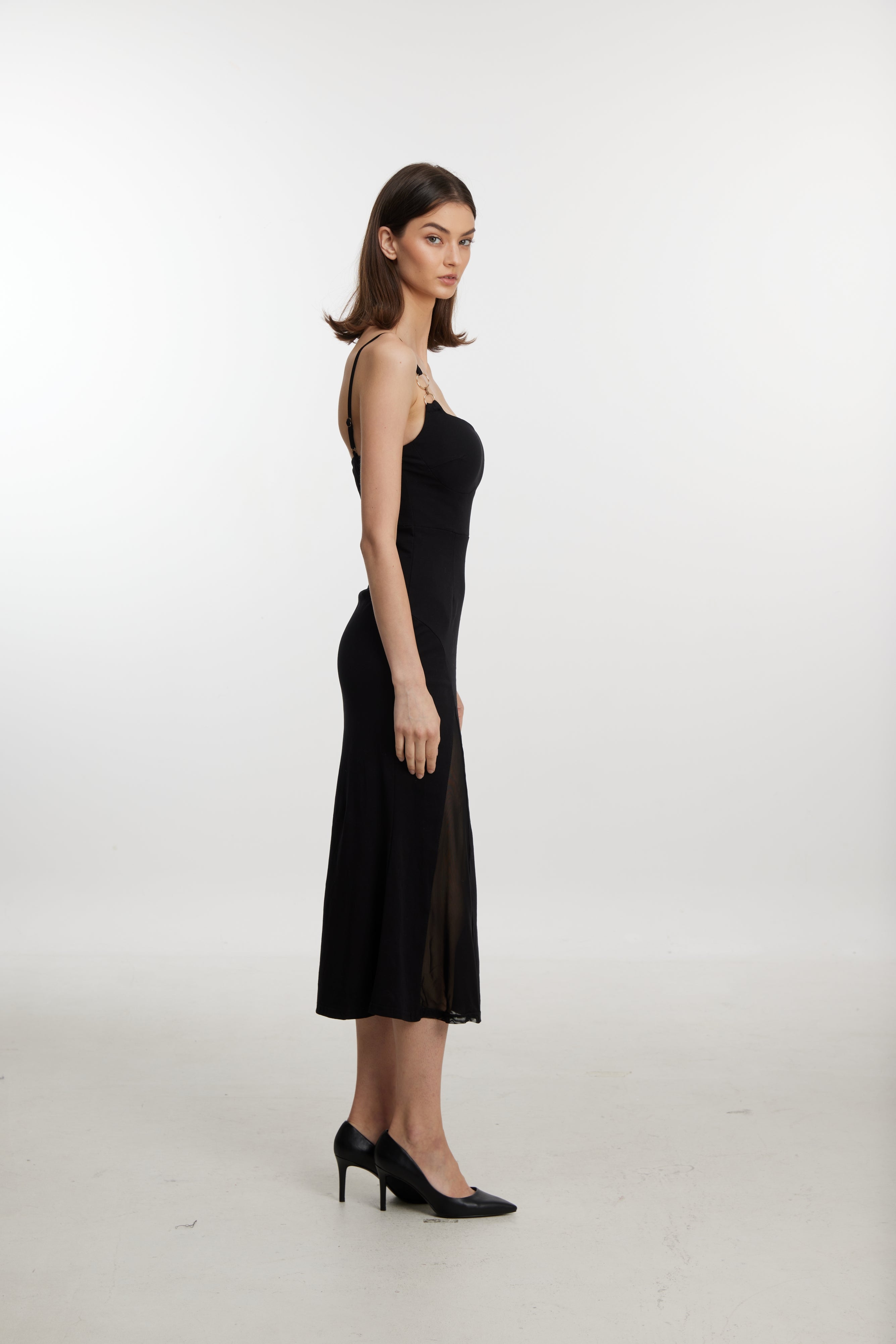 Black slip dress with side cutouts