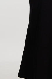 Black slip dress with side cutouts