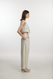 Stylish white ensemble with cropped vest and wide-leg pants
