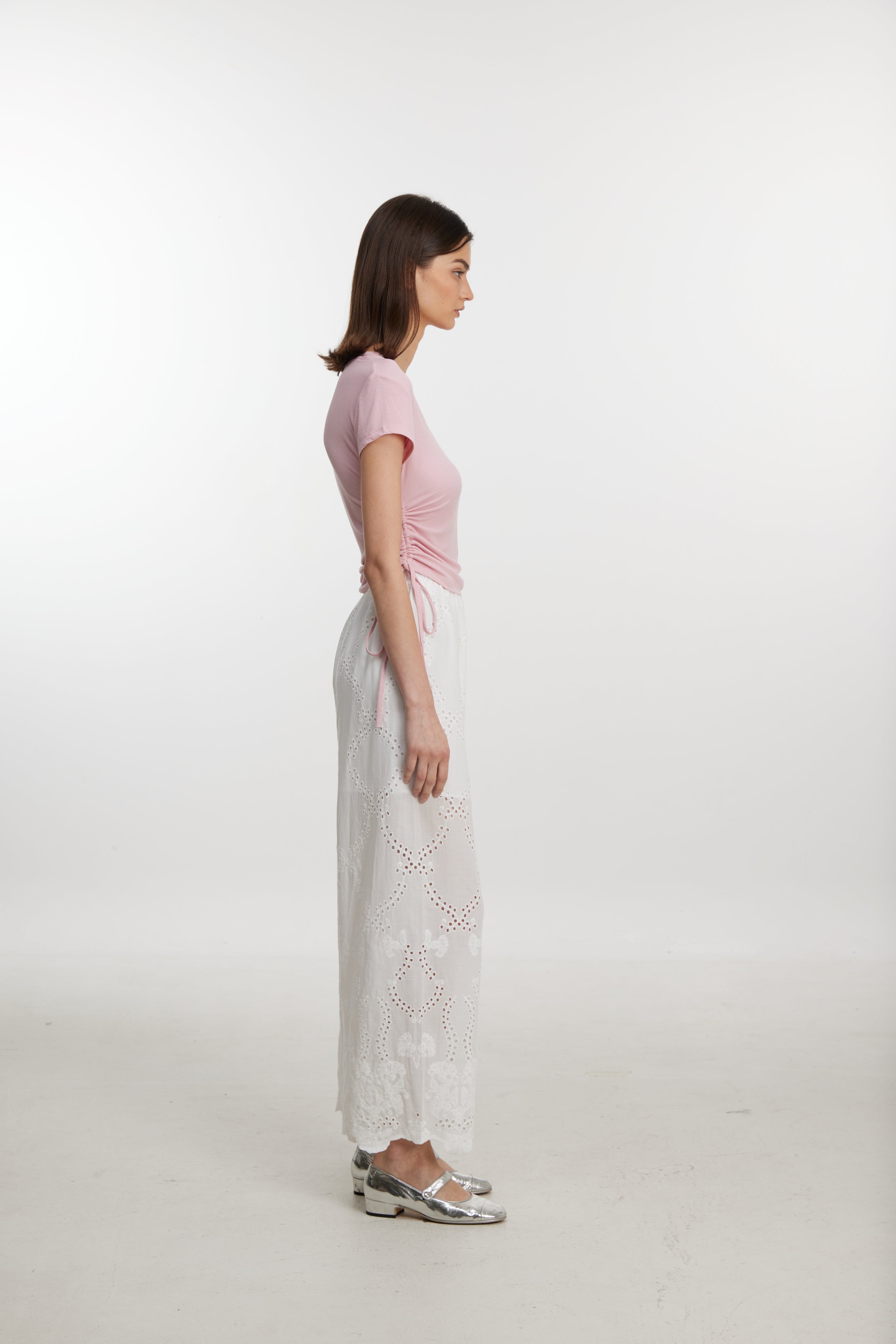 White lace-up trousers
